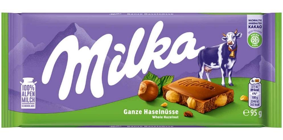 Milka Ganze Haselnüsse 95g Tafel - Knackiger Nussgenuss in zarter Alpenmilch-Schokolade